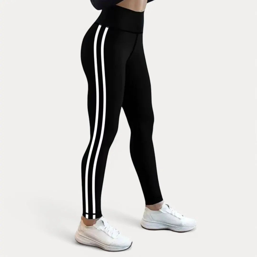 Black gym leggings with double white side stripes, high-waisted sporty cut for performance wear