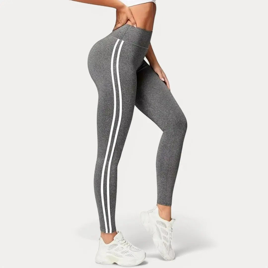 Black gym leggings with double white side stripes, high-waisted sporty slim fit design