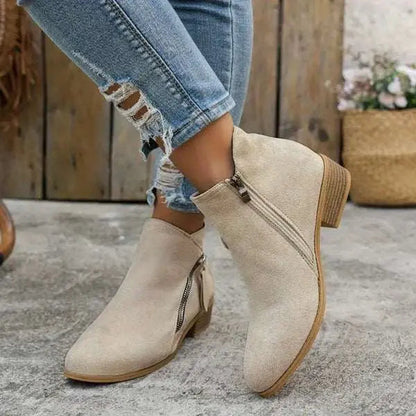 Women's ergonomic ankle boots in neutral tones, wide-fit silhouette with cushioned supportive sole