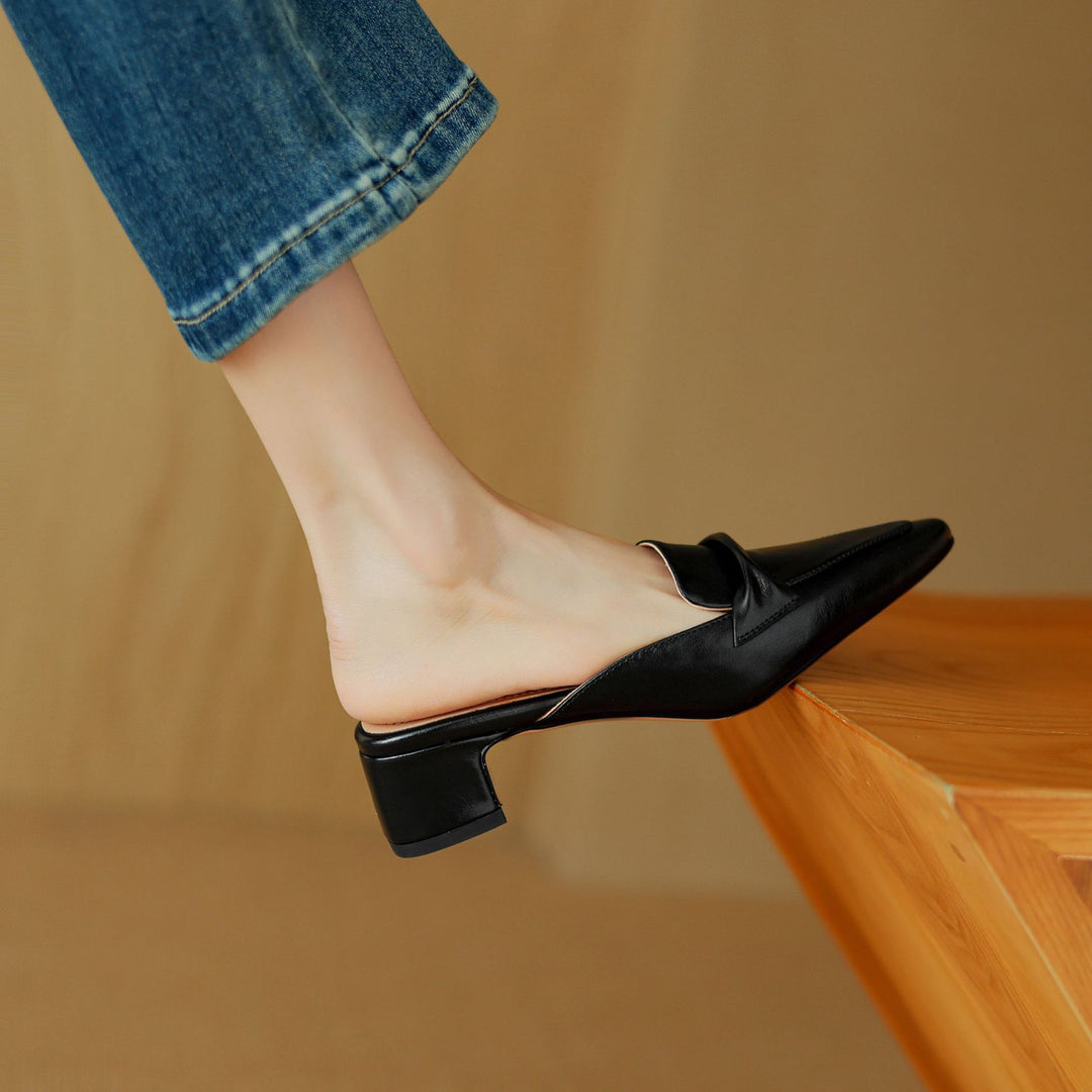 Cenara women's leather mules with elegant bow-trim detail, cushioned insole, timeless refined style
