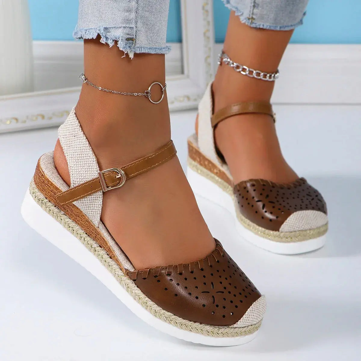 Women's closed toe espadrille wedge sandals with jute-wrapped platform and buckle strap detail
