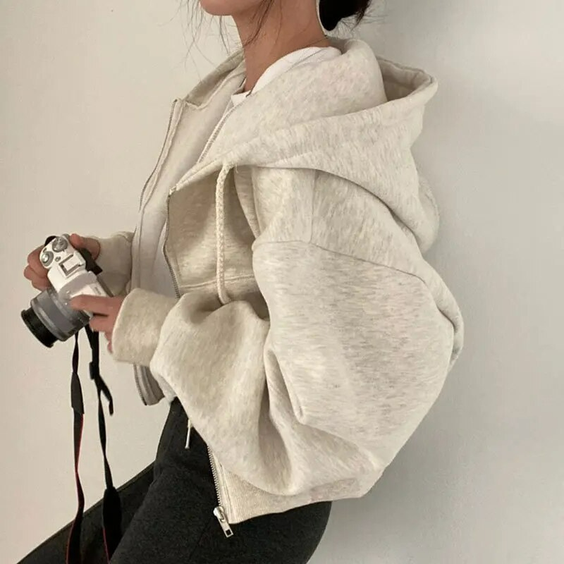 Women's cropped oversized plush fleece hooded jacket with zip front in cozy everyday style