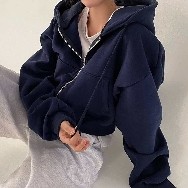 Women's oversized cropped plush fleece hooded jacket with zip front closure in cozy everyday style
