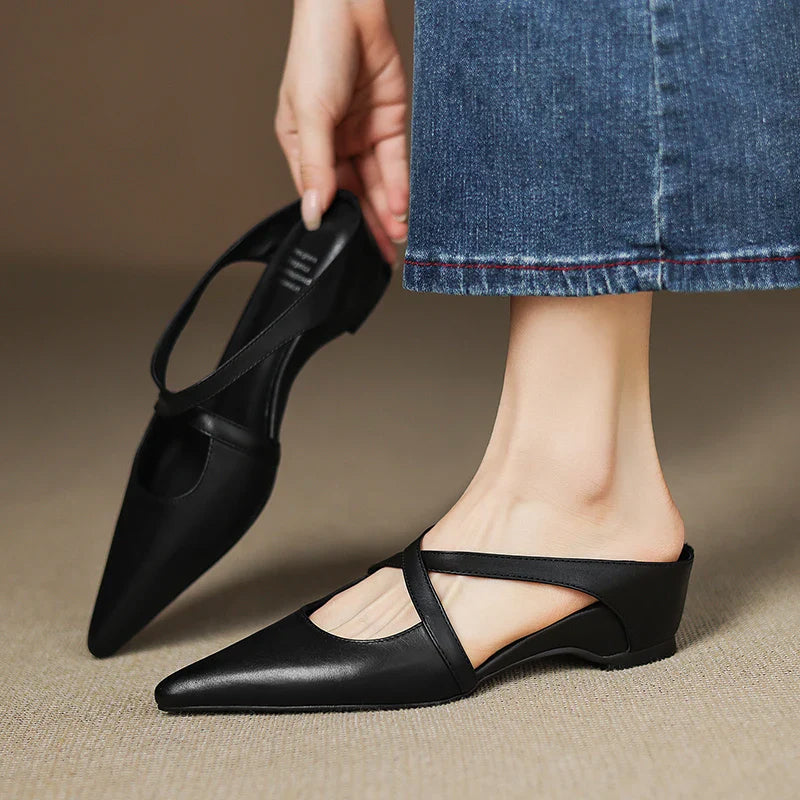 Beige genuine leather pointed-toe flats with criss-cross strap detail, handcrafted for elegant daily wear