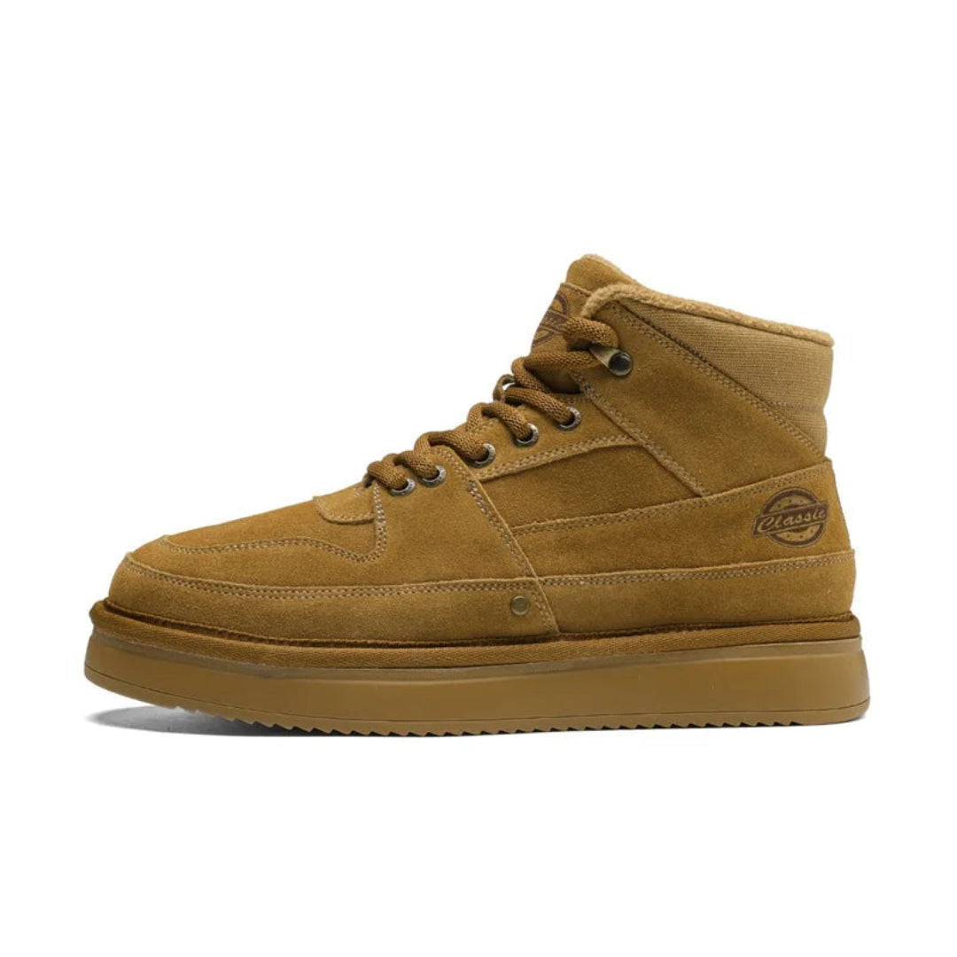 Brown leather high-top boots with fur lining, metal eyelets, and thick traction sole for cold weather