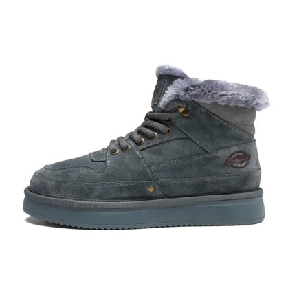 Brown vegan leather high-top boots with fur lining, metal eyelets, and thick traction sole
