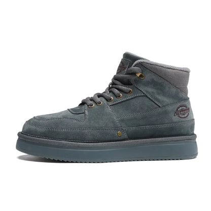 Brown vegan leather high-top boots with fur lining, metal eyelets, and thick traction sole