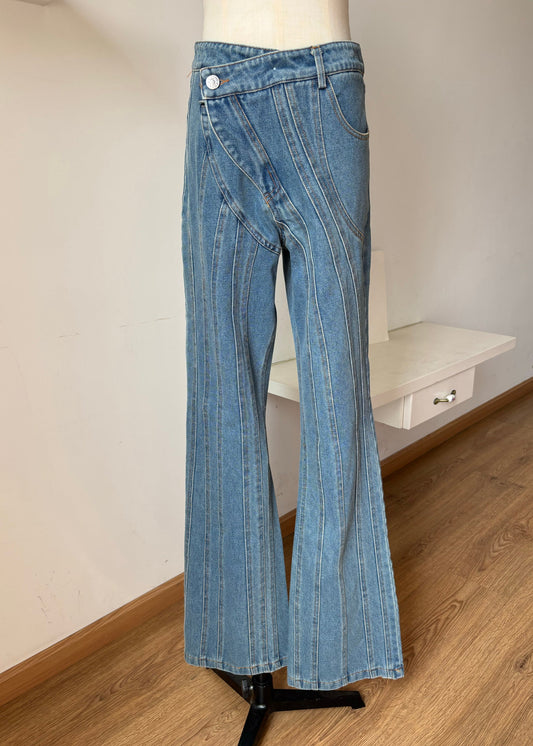 Pantalon évasé en denim bleu à poches asymétriques pour l'automne - Wavlynn