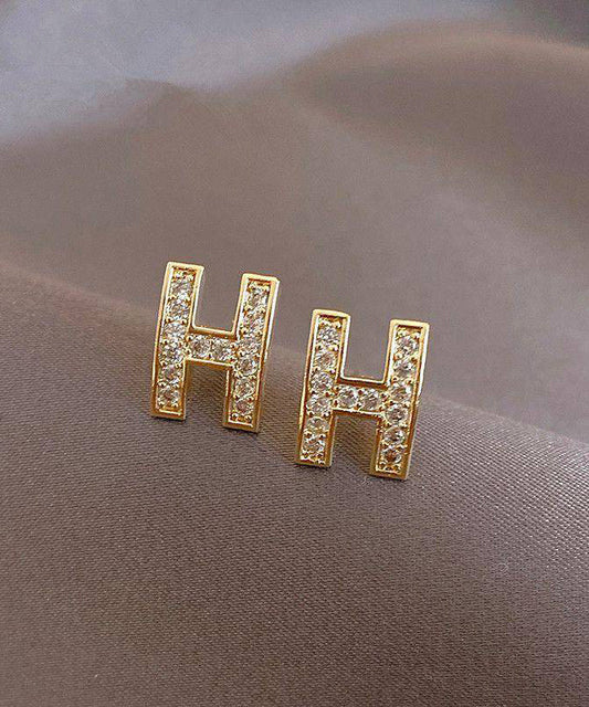 Boucles d'oreilles à tige tendance en alliage d'or et zircon avec motif graphique H - Wavlynn