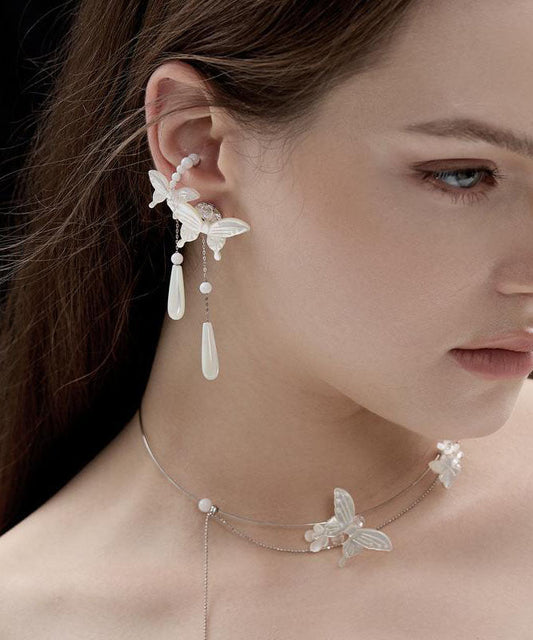 Boucles d'oreilles pendantes en argent sterling blanc avec perles et papillon - Wavlynn