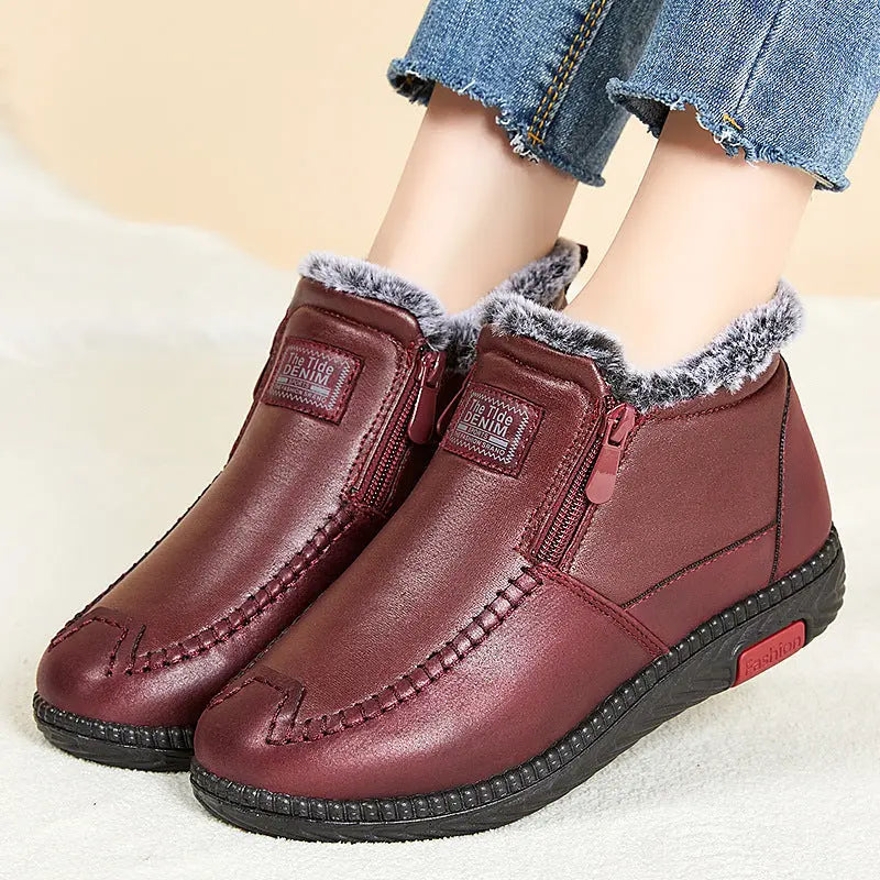 Women's faux fur-lined ankle boots in neutral tone, retro-inspired silhouette with plush cozy lining