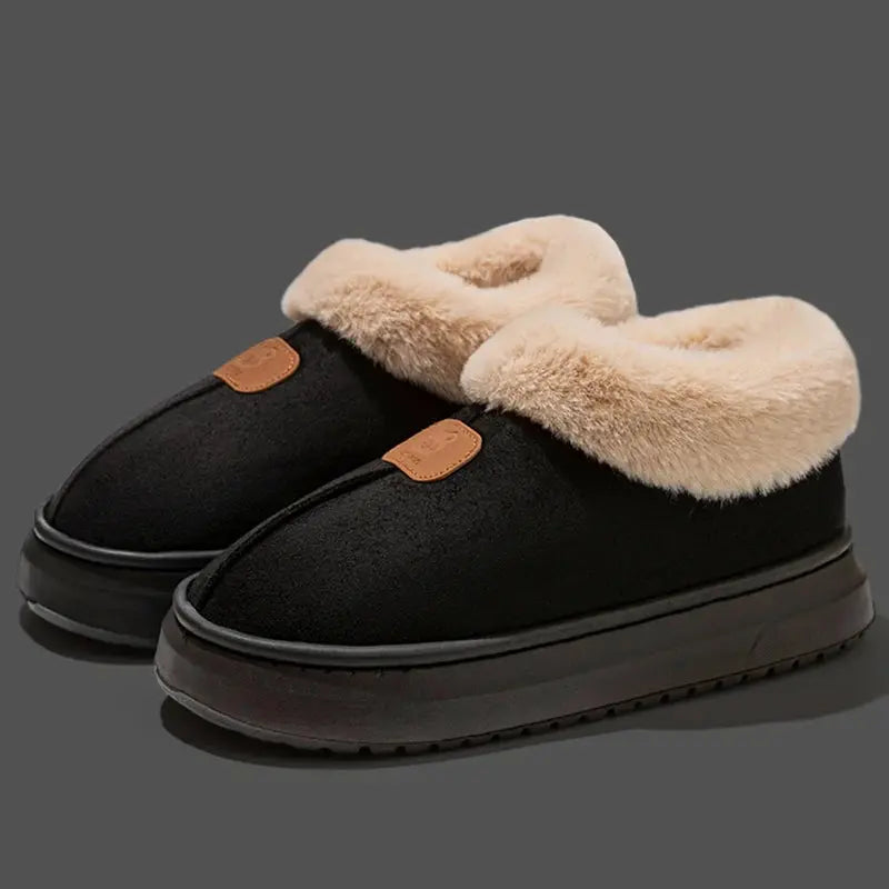 Women's black faux fur platform snow boots with cozy lining and elevated chunky sole