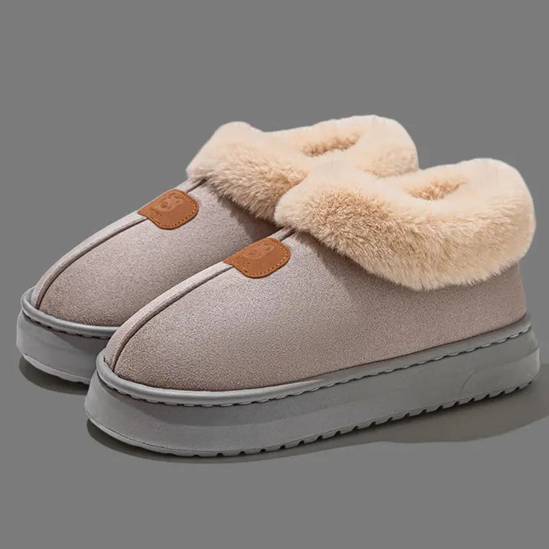 Women's black faux fur platform snow boots with cozy lining and elevated chunky sole