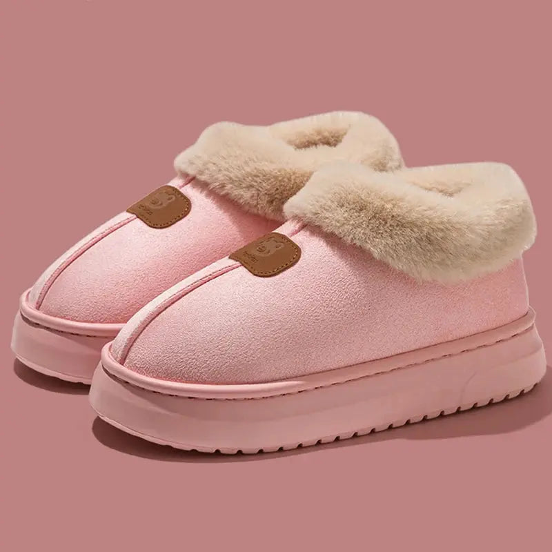 Women's black faux fur platform snow boots with cozy lining and elevated chunky sole