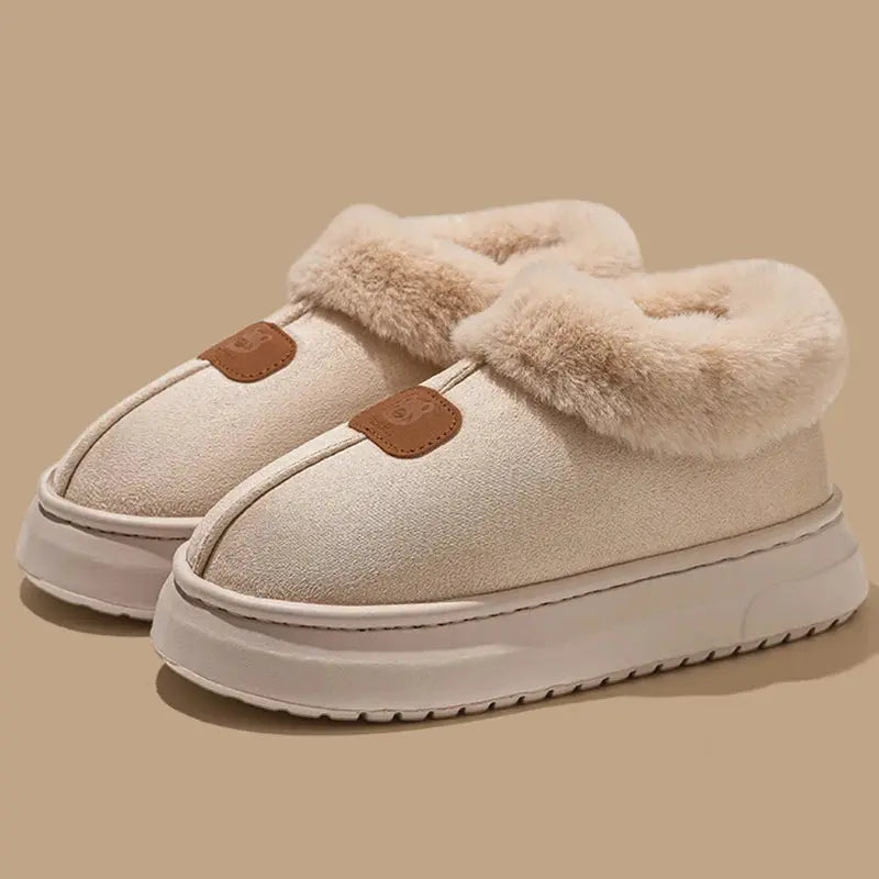 Women's black faux fur platform snow boots with cozy lining and elevated chunky sole