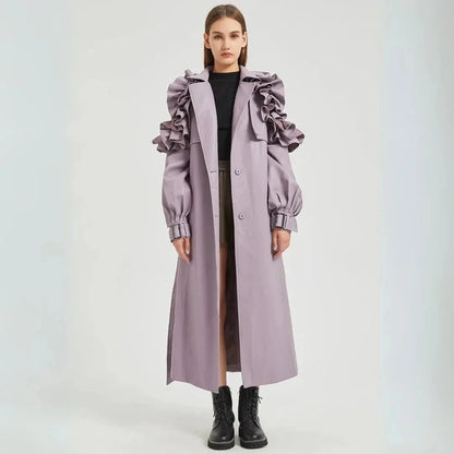 Wavlynn Faye beige faux leather longline trench coat with dramatic ruffled sleeves and cinched belt
