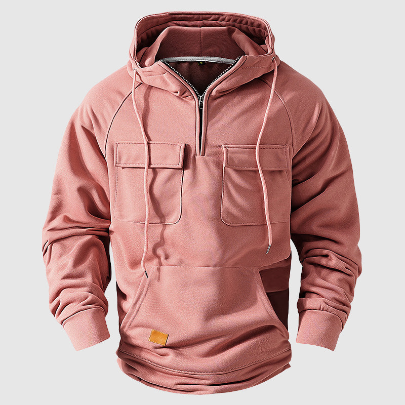 Gray cotton relaxed-fit hoodie with zip neck closure and multiple functional pockets