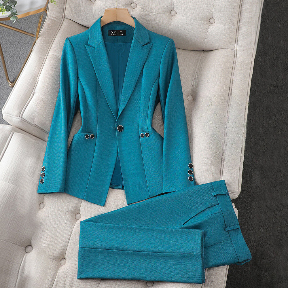 Ivory tailored blazer and pants power set with elegant lapel collar and refined button closure