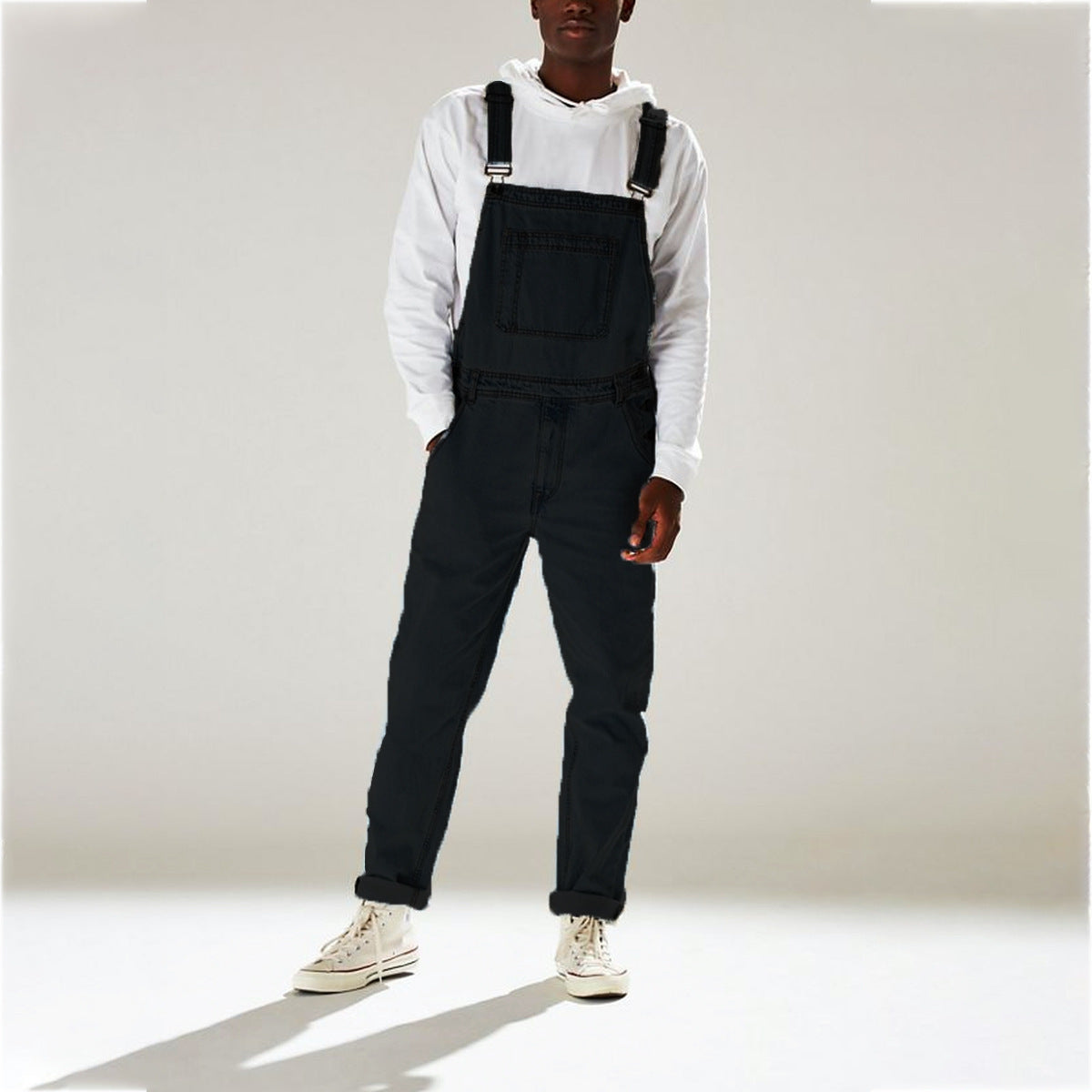 Women's blue denim utility overalls with adjustable straps and reinforced stitching streetwear style