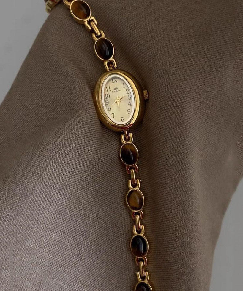 Montres à mouvement à quartz en verre trempé et alliage métallique doré fin - Wavlynn