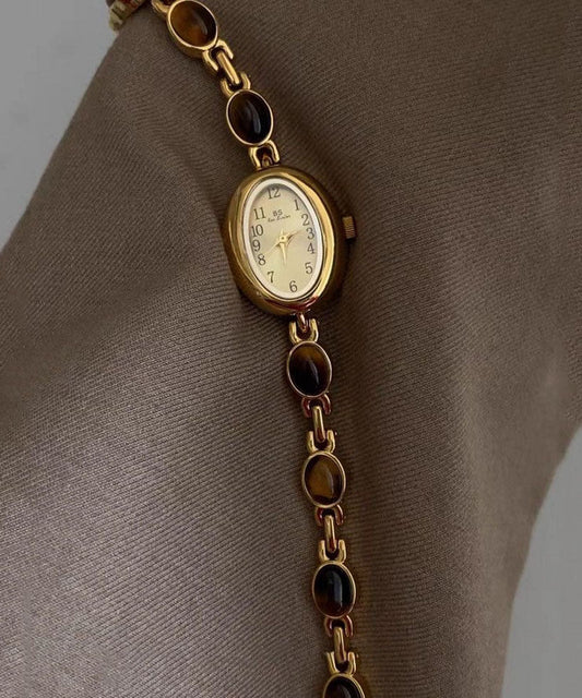 Montres à mouvement à quartz en verre trempé et alliage métallique doré fin - Wavlynn