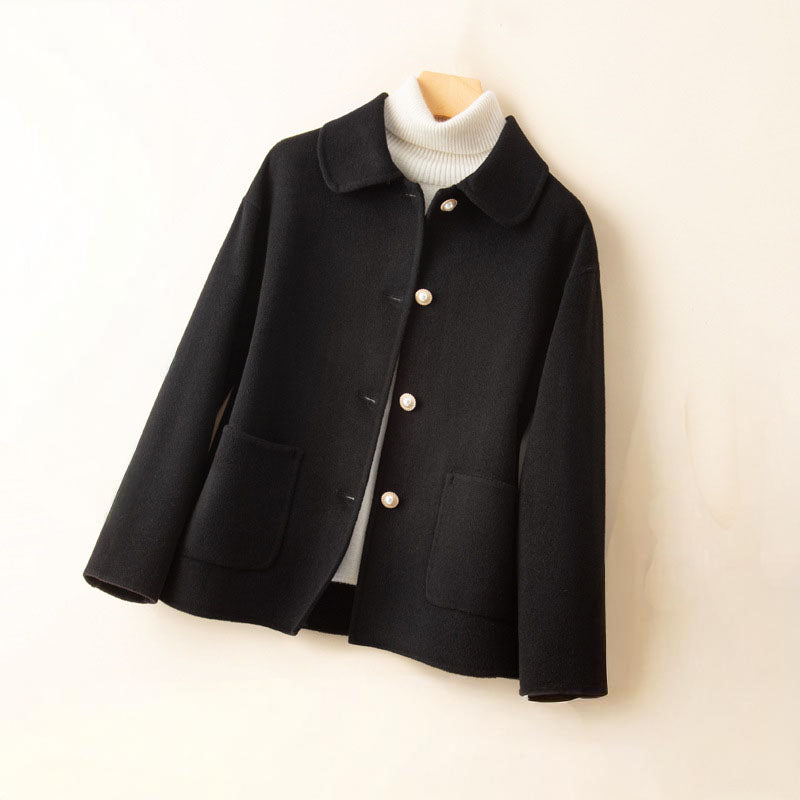 Ivory pure cashmere knit jacket with spread collar, button-front closure, and dual patch pockets