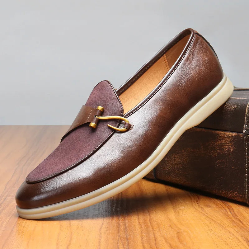 Sleek black leather dress shoes with textured suede panel accent, refined silhouette for all-day comfort