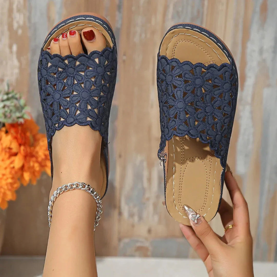 Women's floral cut-out low-heel slide sandals with intricate openwork botanical knit upper