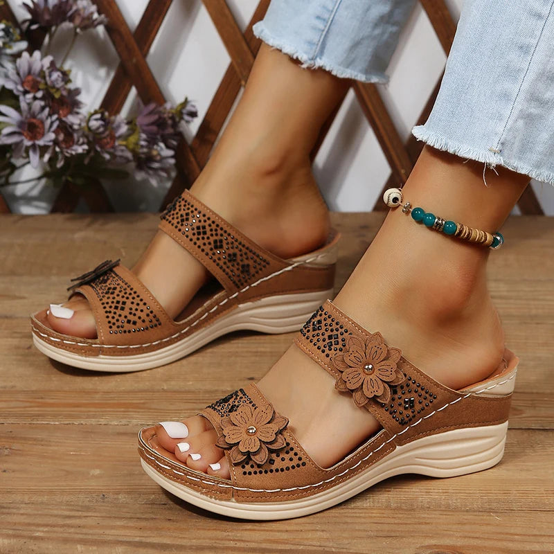 Women's wedge sandals with floral appliqué straps, cushioned footbed, stylish warm-weather heels