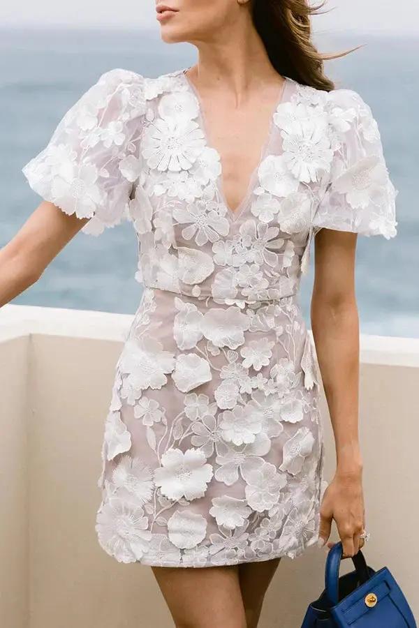 White floral embroidered mini dress with V-neckline, lightweight feminine summer style