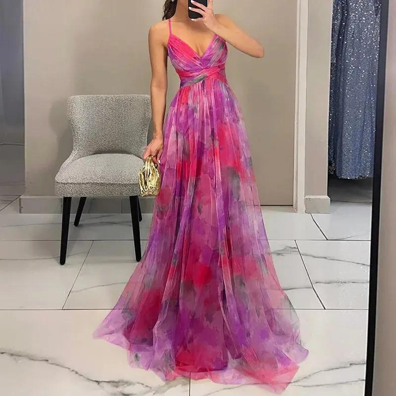 Women's floral maxi dress soft pastel watercolor print flowing chiffon silhouette for summer weddings
