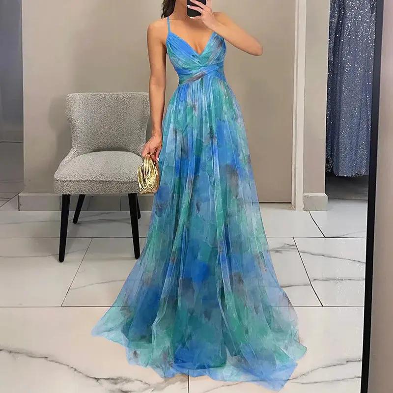 Women's pastel floral chiffon maxi dress, elegant airy silhouette with watercolor bloom print for summer weddings