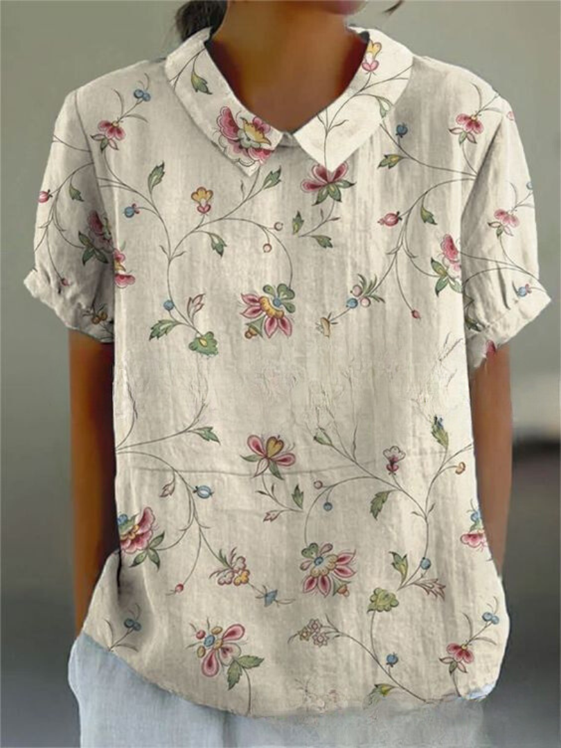 Women's relaxed floral shirt with feminine print, lightweight fabric, and effortless casual style