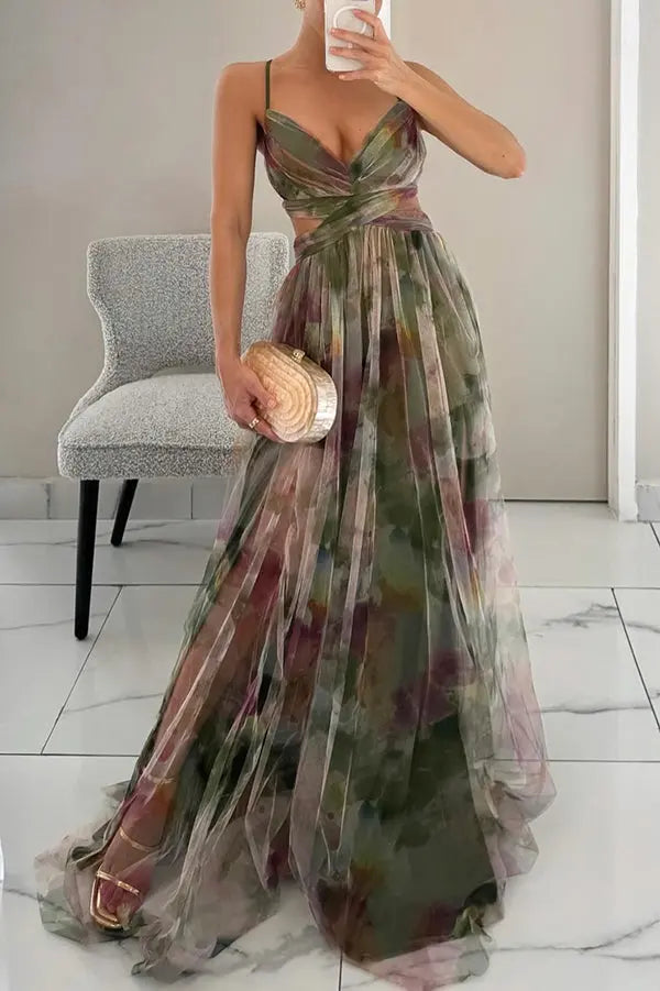 Women's flowing maxi dress in romantic painterly print, elegant whimsical silhouette with fluid long lines