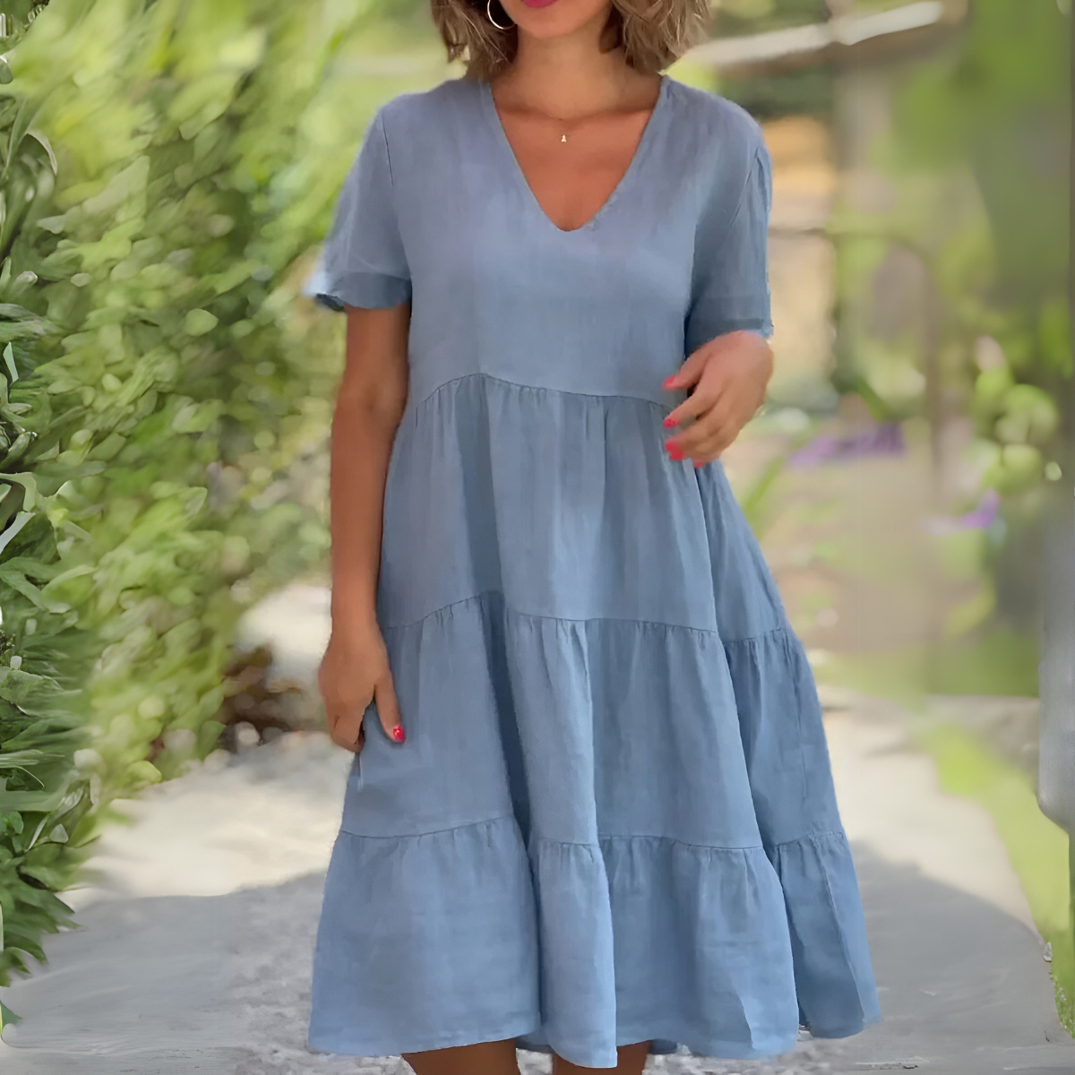 Women's flowy V-neck tummy control dress in soft draping silhouette for effortless elegant style