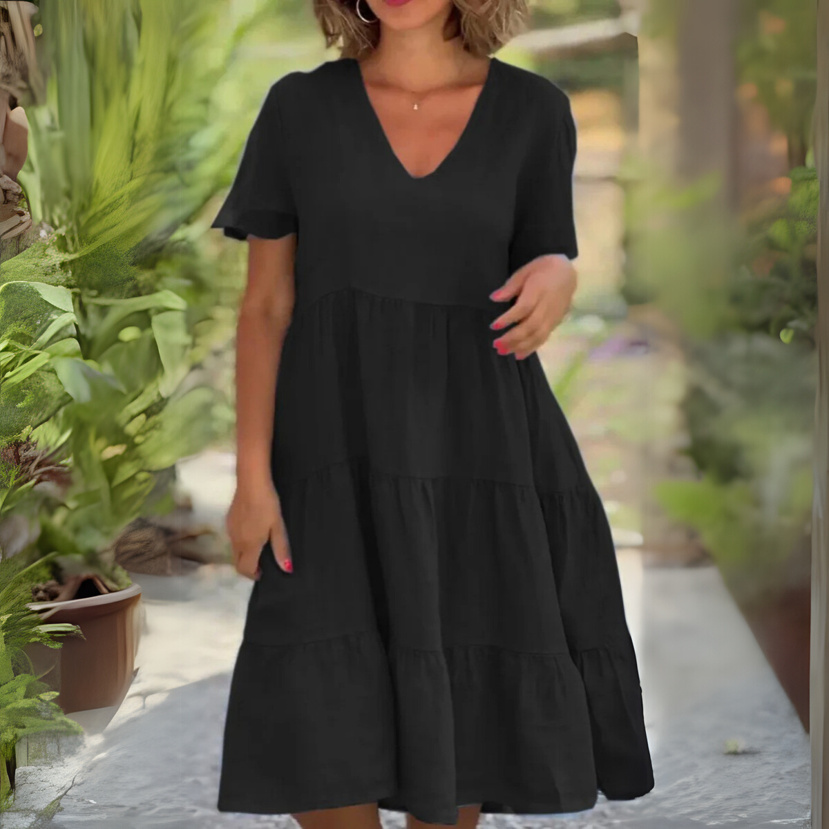 Women's flowy V-neck tummy control dress in elegant draping silhouette for effortless style