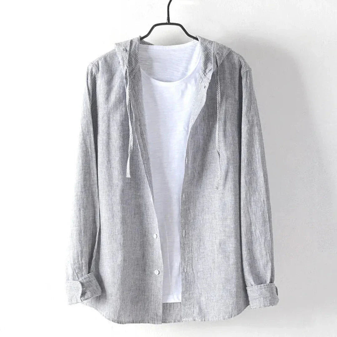 Beige linen hooded button-up shirt with built-in white tee and drawstring hood, casual beach style