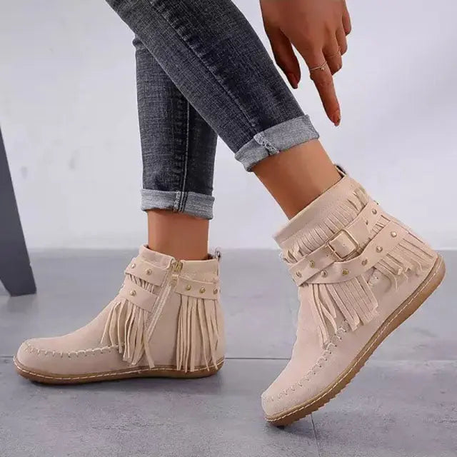 Black fringe buckle boots for women with rivet details and chic belt buckle accent