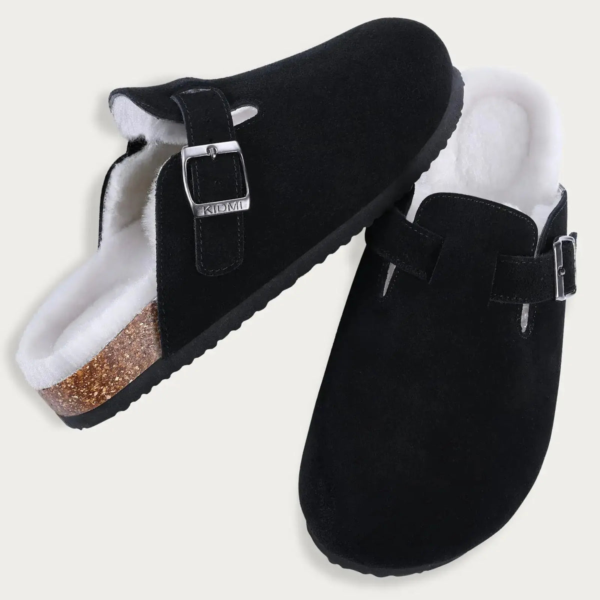 Women's brown suede fur-lined clogs with adjustable buckle strap, cozy winter mule style
