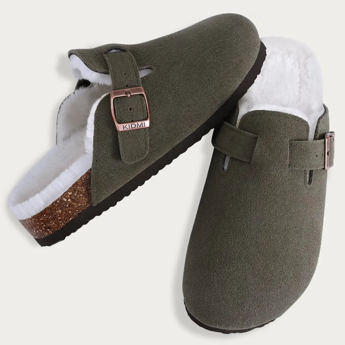 Women's brown suede fur-lined clogs with adjustable buckle strap for cozy winter comfort