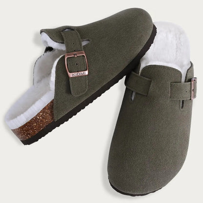 Women's brown suede fur-lined clogs with adjustable buckle strap for cozy winter comfort