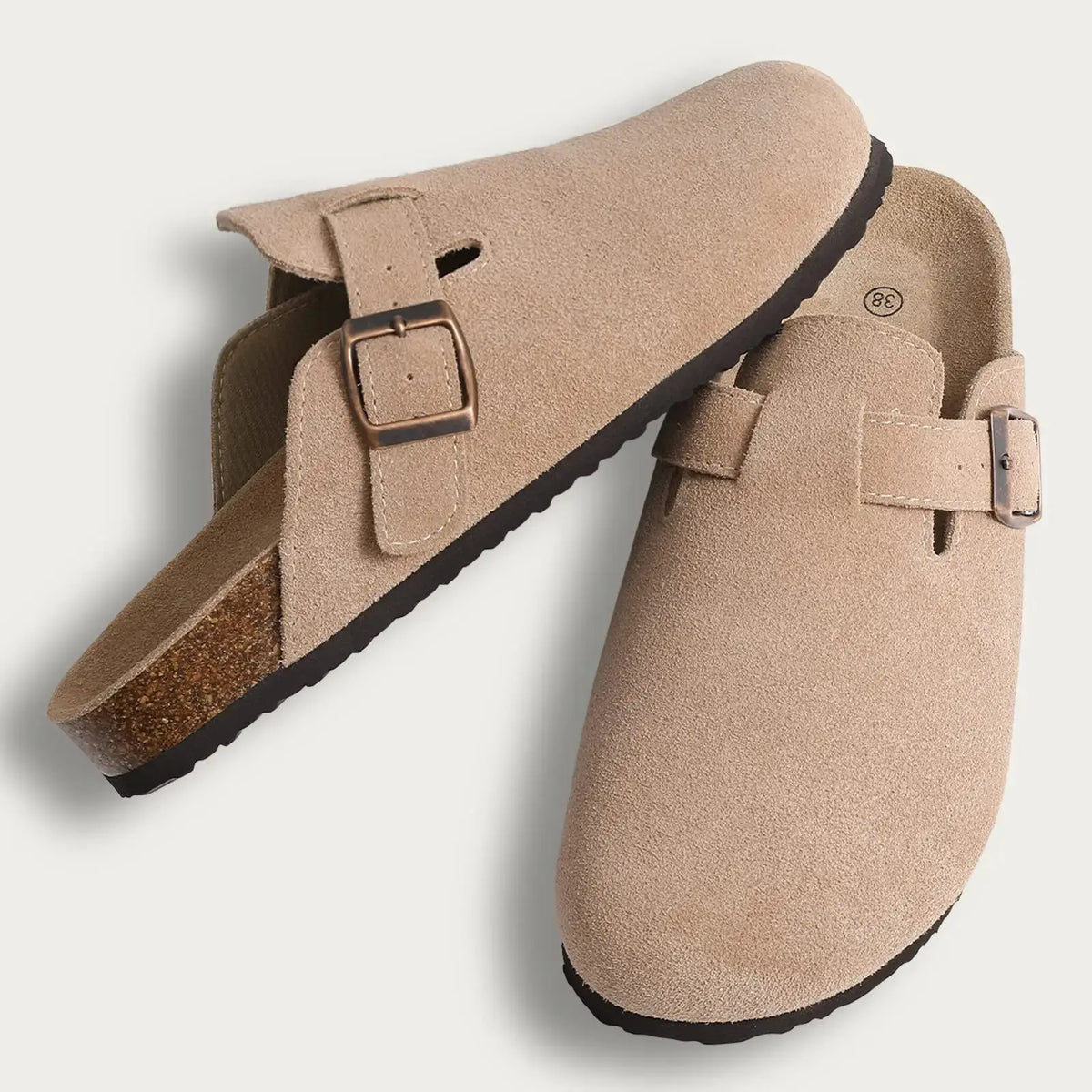 Women's brown suede fur-lined clogs with adjustable buckle strap, cozy winter mule style