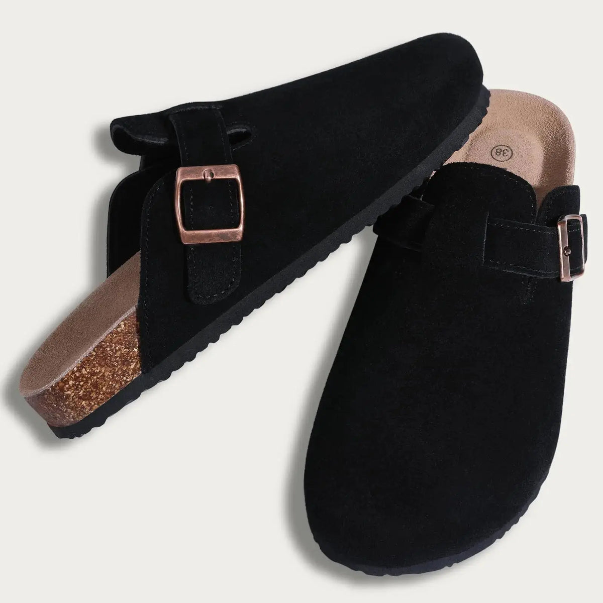 Women's brown suede fur-lined clogs with adjustable buckle strap for cozy winter comfort