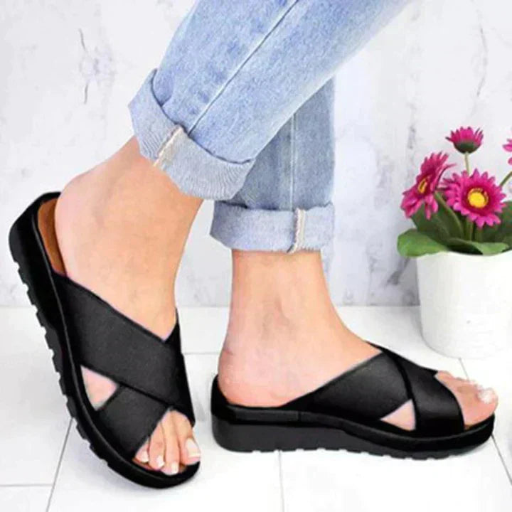 Women's orthopedic adjustable sandals in neutral tones with contoured sole and chic supportive silhouette