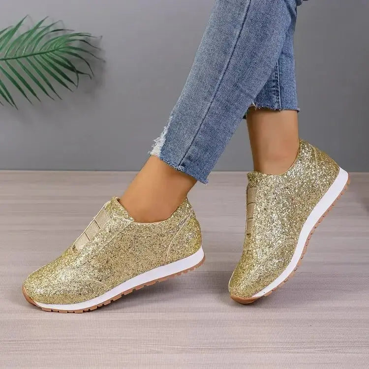 Women's glitter slip-on sneakers with sparkling upper, elastic bands, and laceless casual style