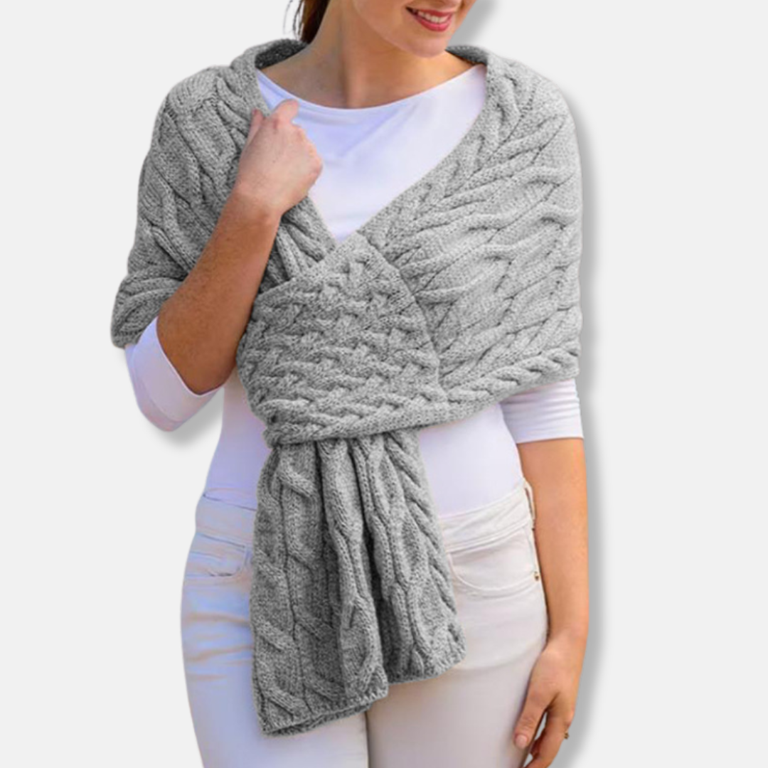 Women's long wool shawl scarf in cable knit pattern with draped silhouette for elegant coverage
