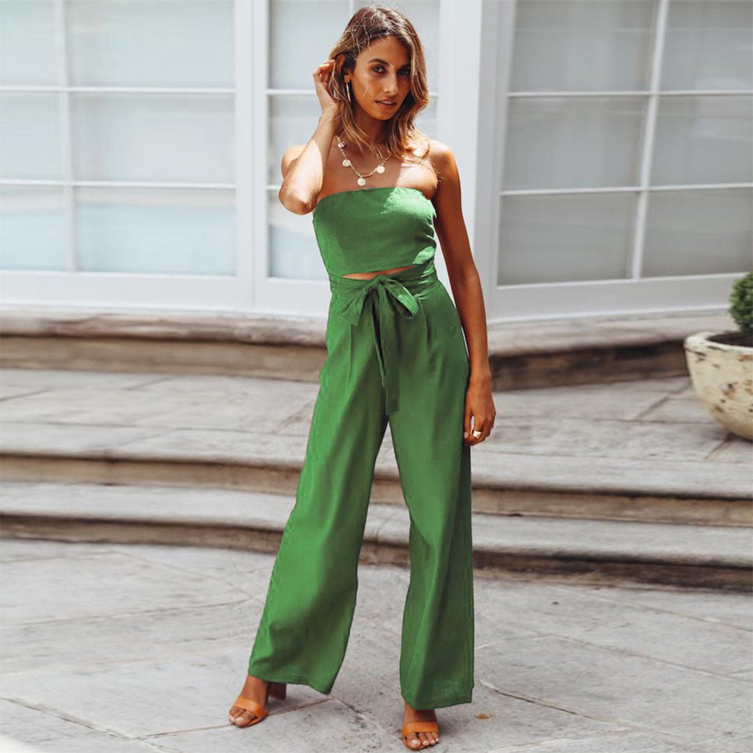 Women's warm beige strapless wide-leg jumpsuit with self-tie waist bow, resort-ready silhouette