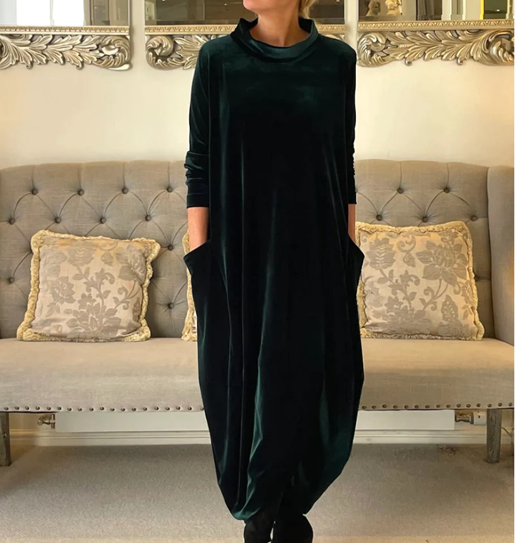 Elegant flowing tunic in soft neutral tones with flattering silhouette and breathable lightweight fabric