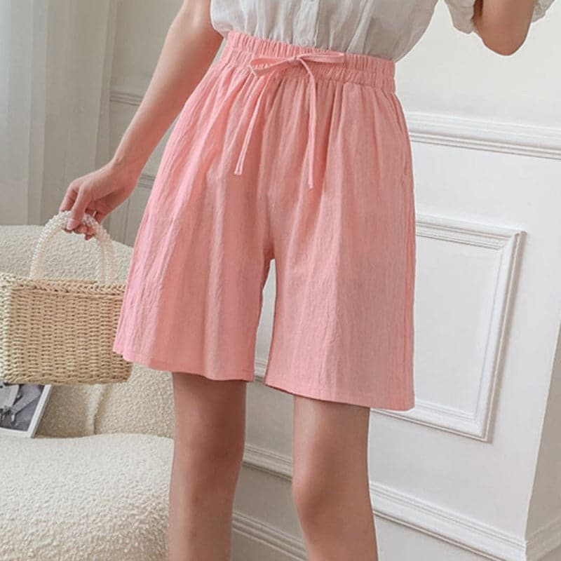 Women's knee-length relaxed fit shorts in cotton blend with elastic waist and adjustable drawstring
