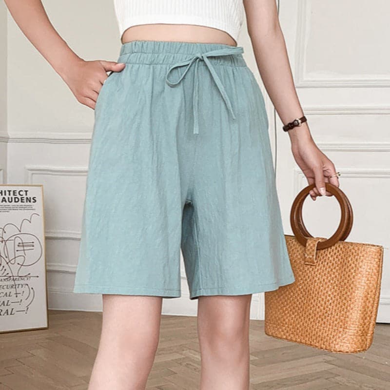 Women's knee-length relaxed fit shorts in cotton blend with elastic waist and adjustable drawstring